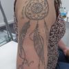 Tatouage bras d'une femme